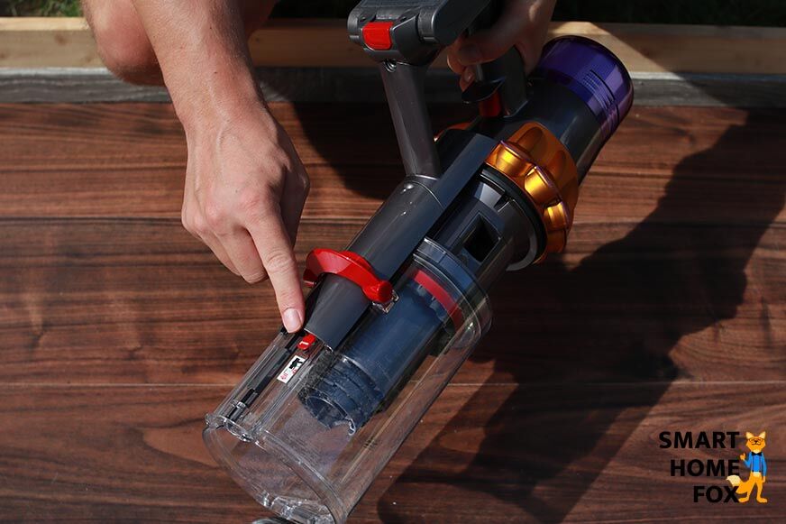 Hebel zum Abnehmen des Behälters